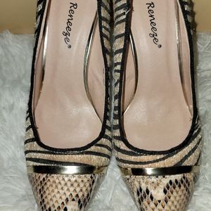 Never worn, animal print heels